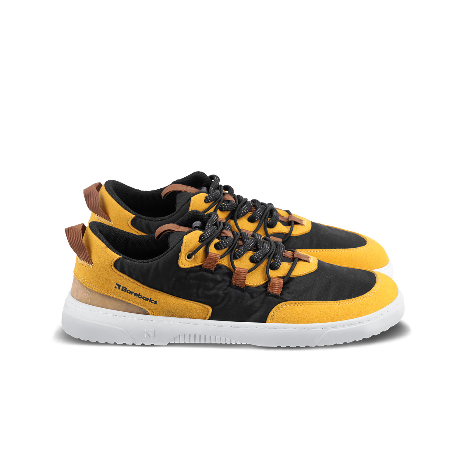 Sneakers Barefoot Barebarics - Revive - Golden Yellow & Black.
Des matériaux durables et végétaliens avec une excellente solidité des couleurs, une respirabilité et une résistance à la déchirure et à l’abrasion ont été utilisés dans la production.
	La tige est composée de microfibre et de polyester, qui sont développés en utilisant les meilleures technologies pour obtenir des matériaux durables.
Attributs barefoot
Forme anatomique - Les basket respectent la forme du pied.
Plus d'information
design urbain moderneconçu et fabriqué à la main dans l’Union européenne, à partir de matériaux durables locauxexcellente durabilité et solidité des couleurs des matériauxTechnologie Dermodry Coolmax® pour une élimination continue de l’humiditédisponible en numéros : 36 - 47 (selon mesure européenne)chaussure de ville